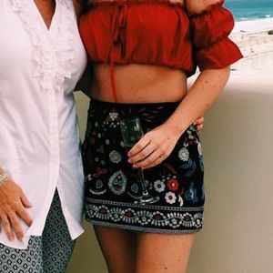 Embroidered black mini skirt